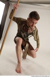 KEETA KNEELING POSE WITH SPEAR